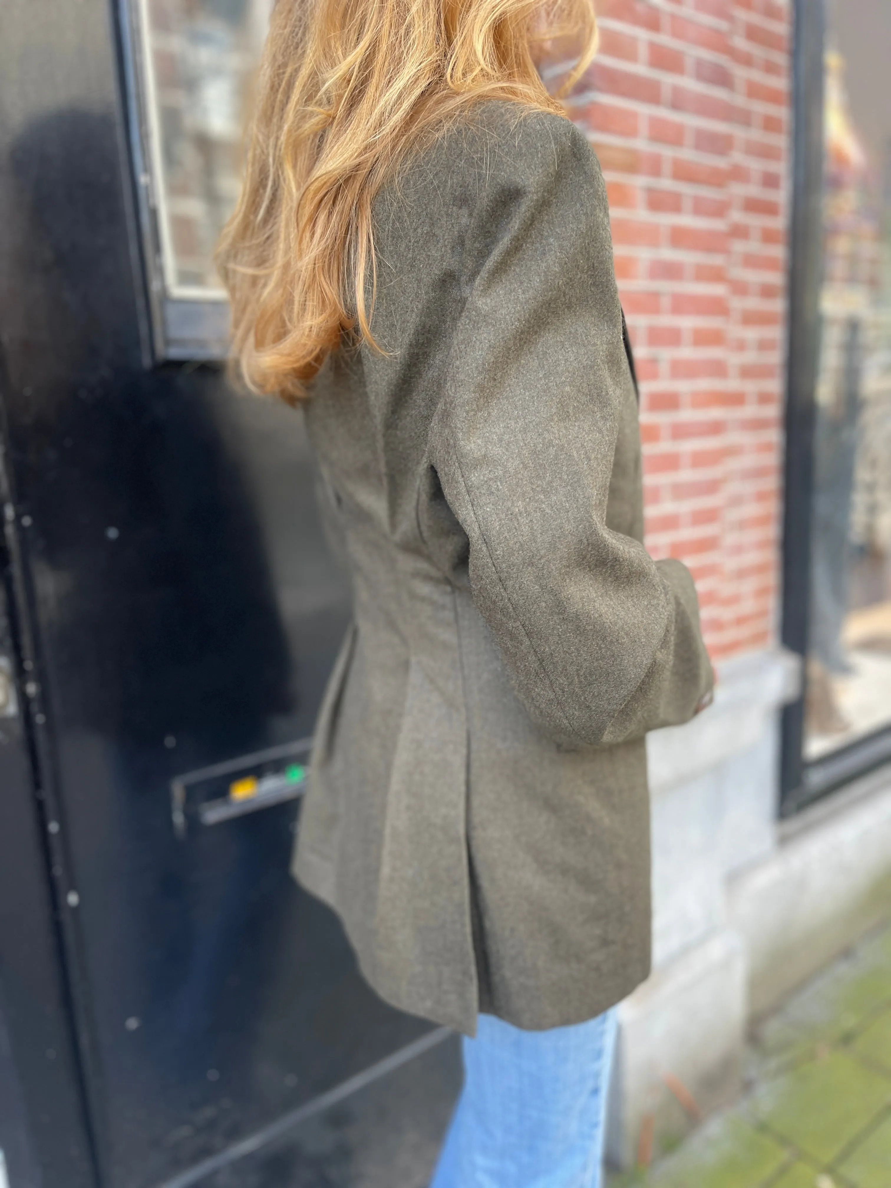 Army green fitted blazer.