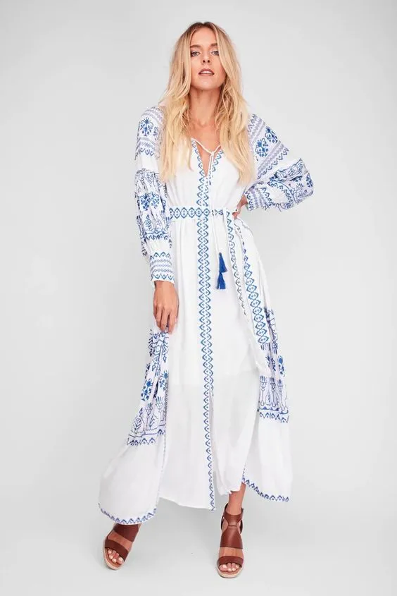 Bahia Maxi Dress White With Blue Embroidery Long Puffed Peasant Sleeves Embroidered Pockets Bohemian Tassel Ties Available In Small Medium Large Or XL